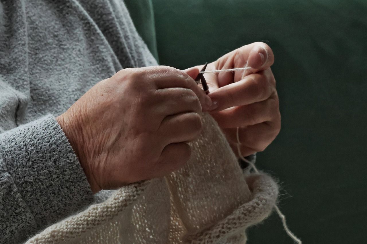 about-us-02 knit, hobby, leisure time, woman, wool, knitting needles, fashion, lifestyle, handwork